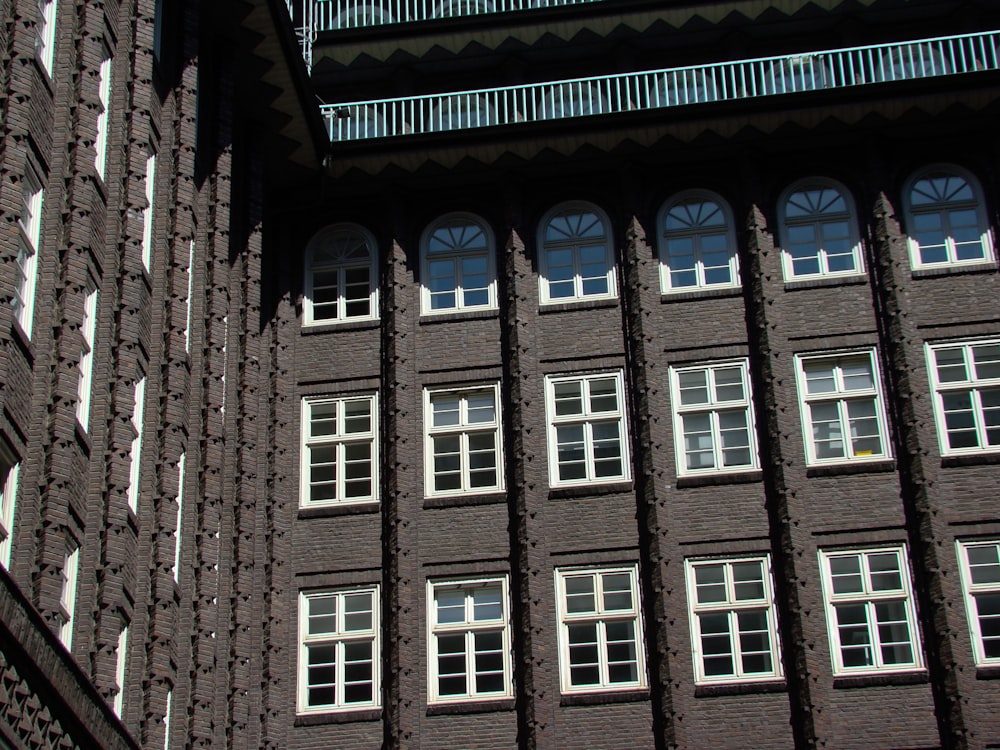 a large building with many windows and a clock