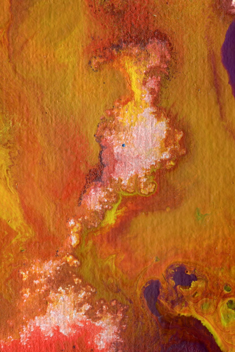 an abstract painting of orange and yellow colors