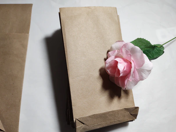 Stack of small recyclable paper bags without handles, perfect for light waste.