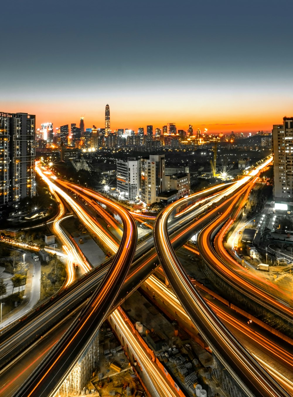 an aerial view of a city at night