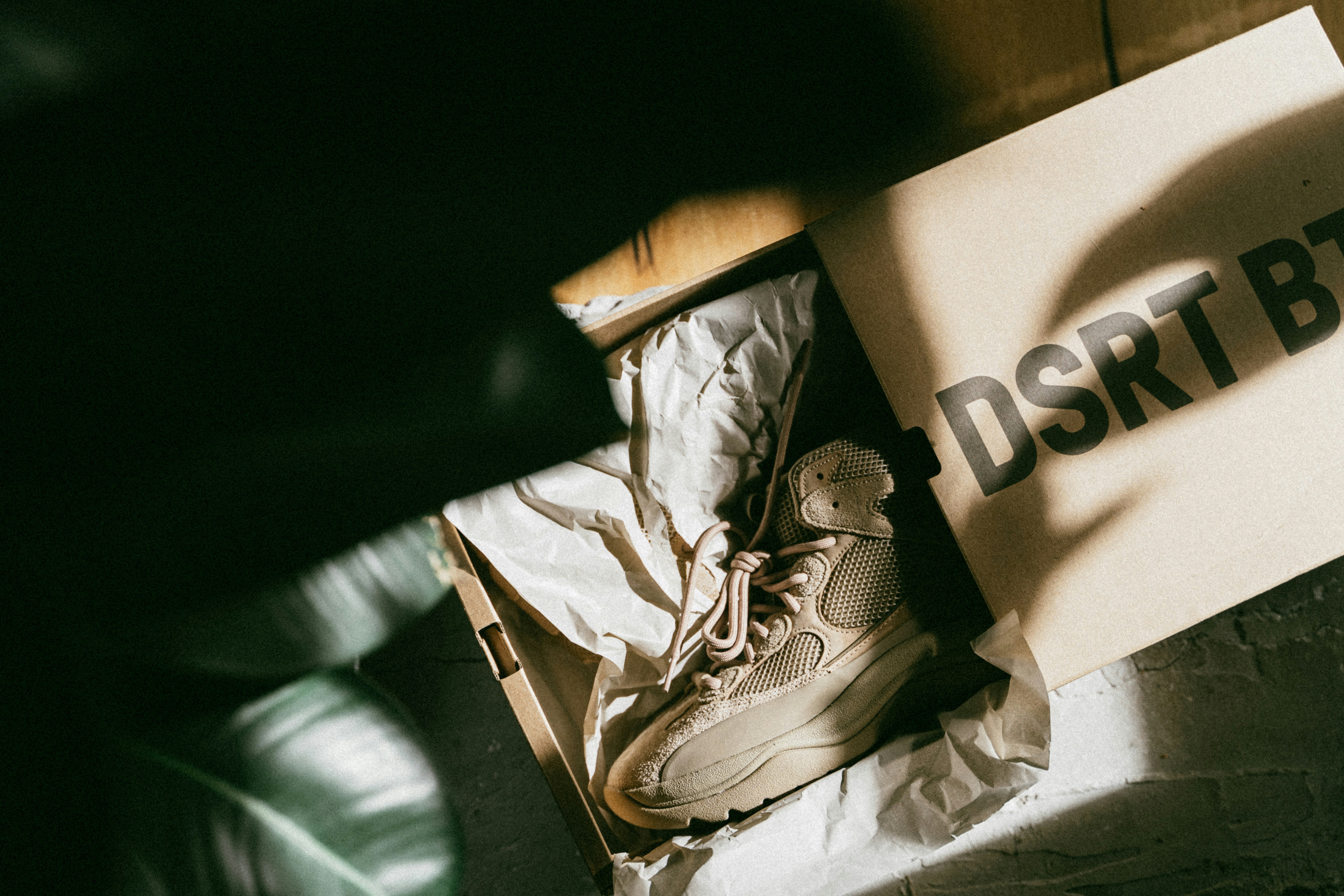 a box with a pair of shoes inside of it