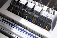 a bunch of wires are plugged into a switch box