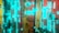 A futuristic, abstract design featuring glowing turquoise lines and geometric patterns on a background of warm, earthy colors like yellow and red. The intricate designs resemble circuit boards or advanced technology panels.