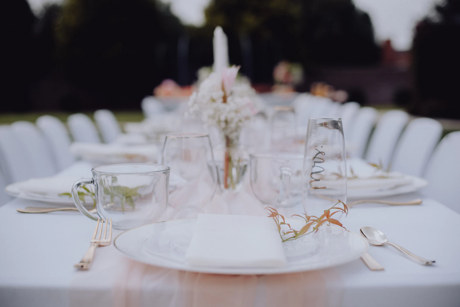 Long table set for an outdoor dinner