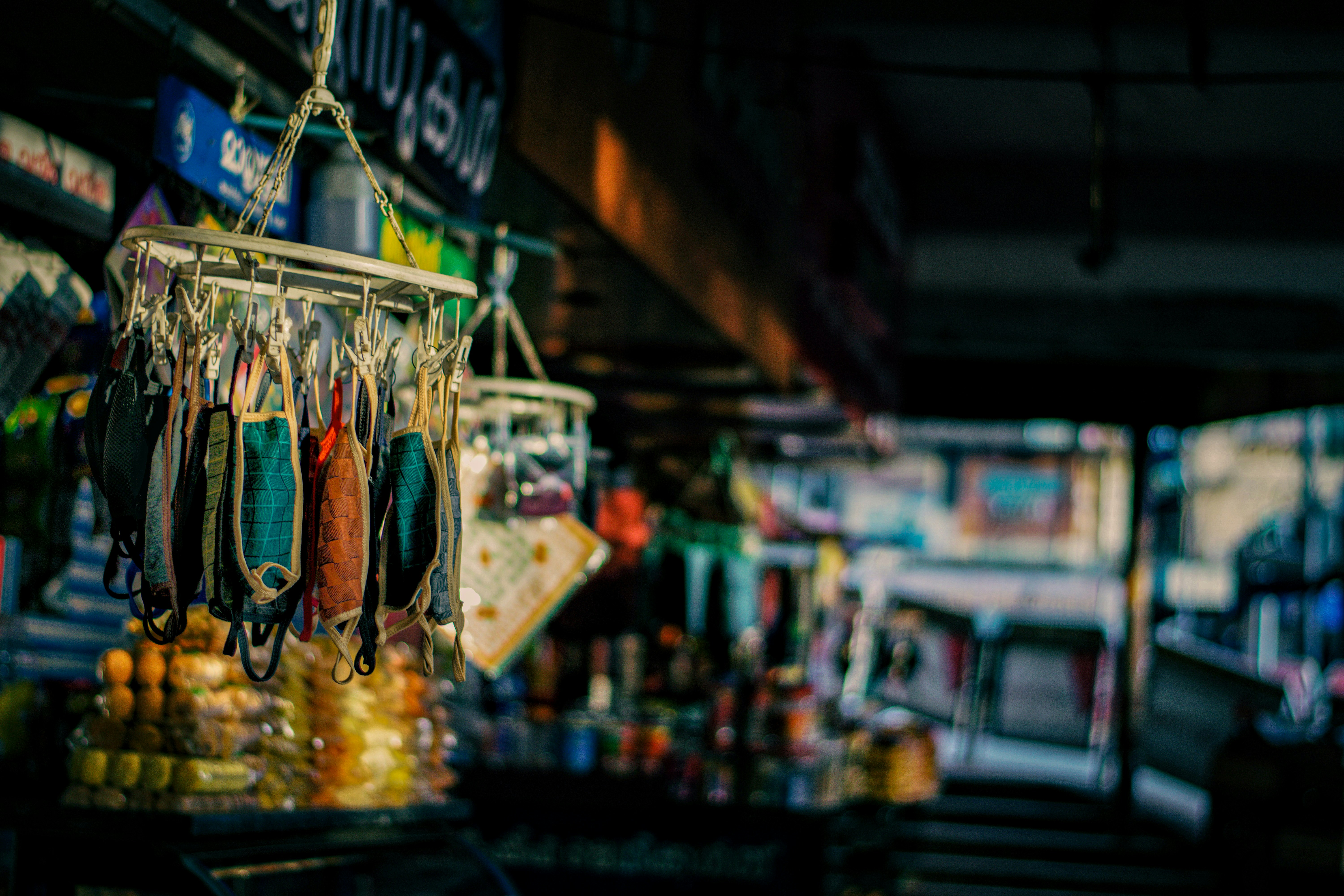 a store with a lot of items hanging from it's ceiling