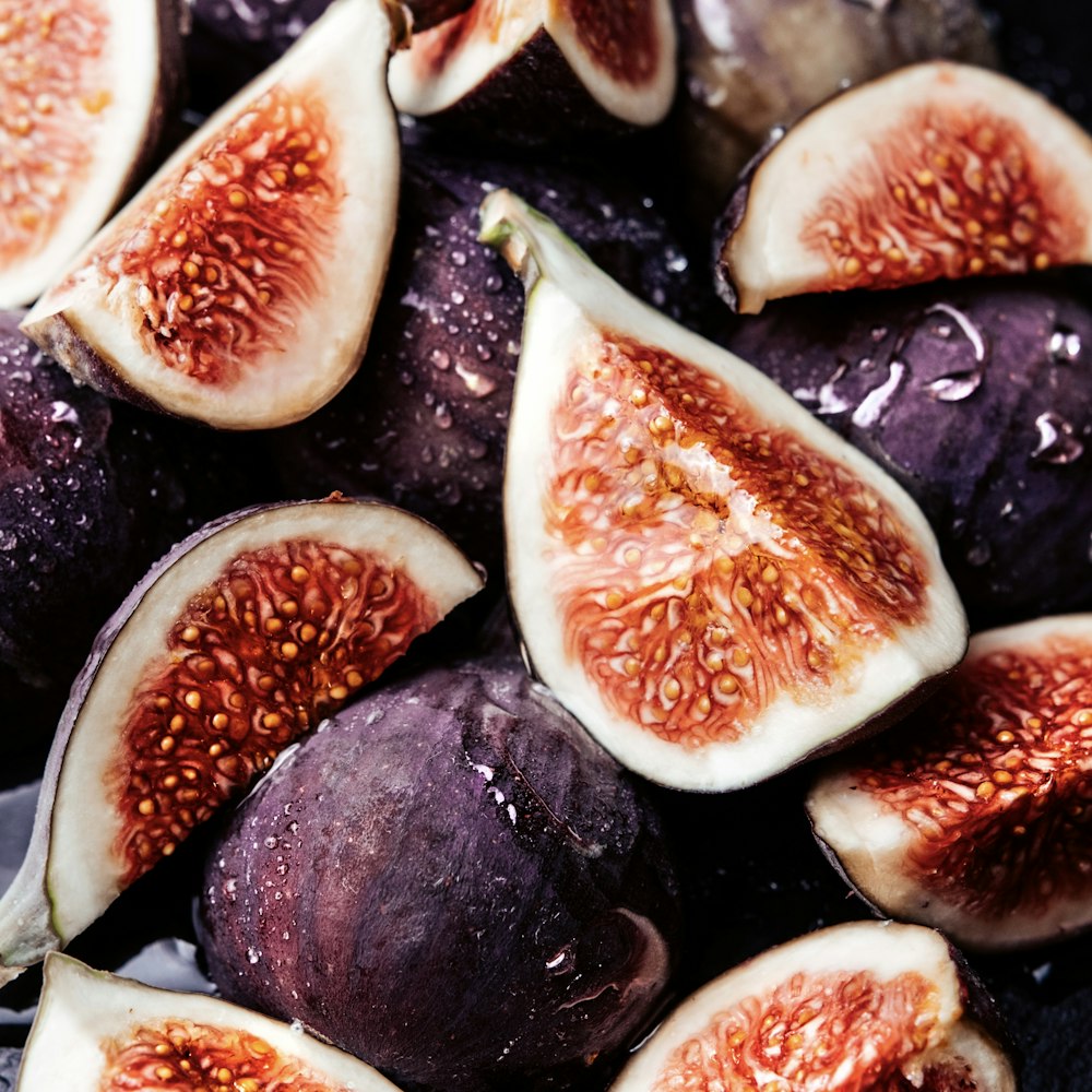 a bunch of figs that are sitting on a table