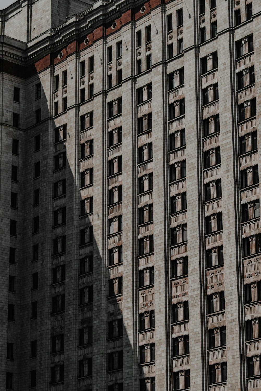 a tall building with a clock on the top of it