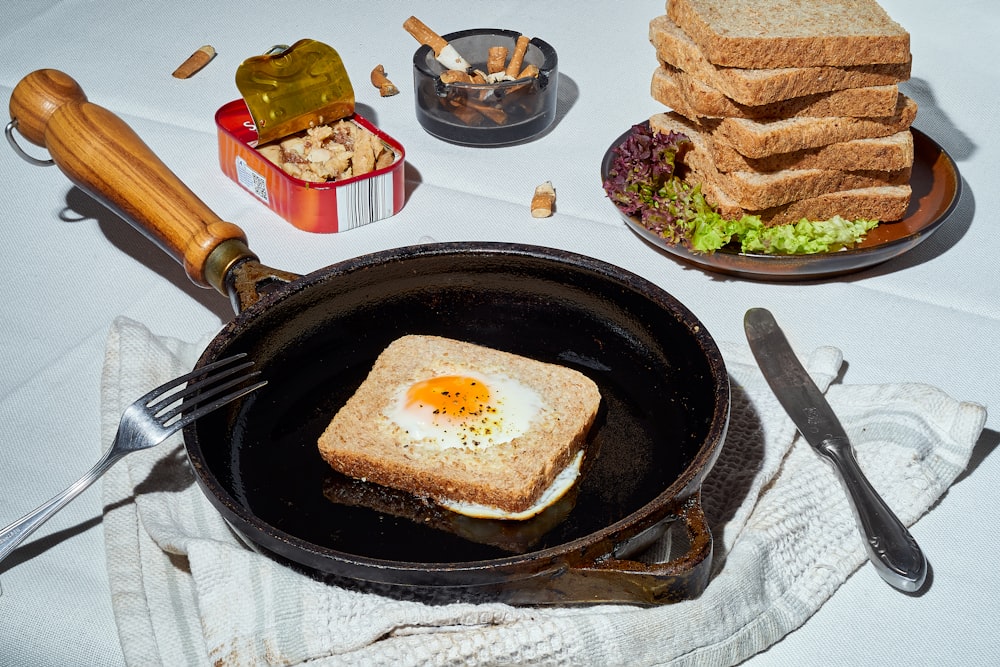 a pan with toast and an egg on it