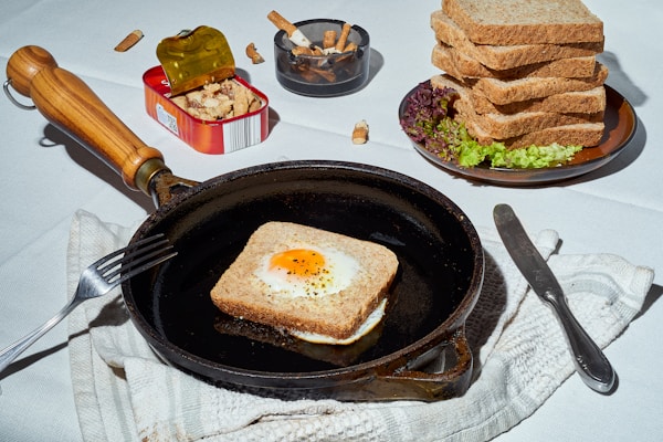A pan with toast and an egg on it