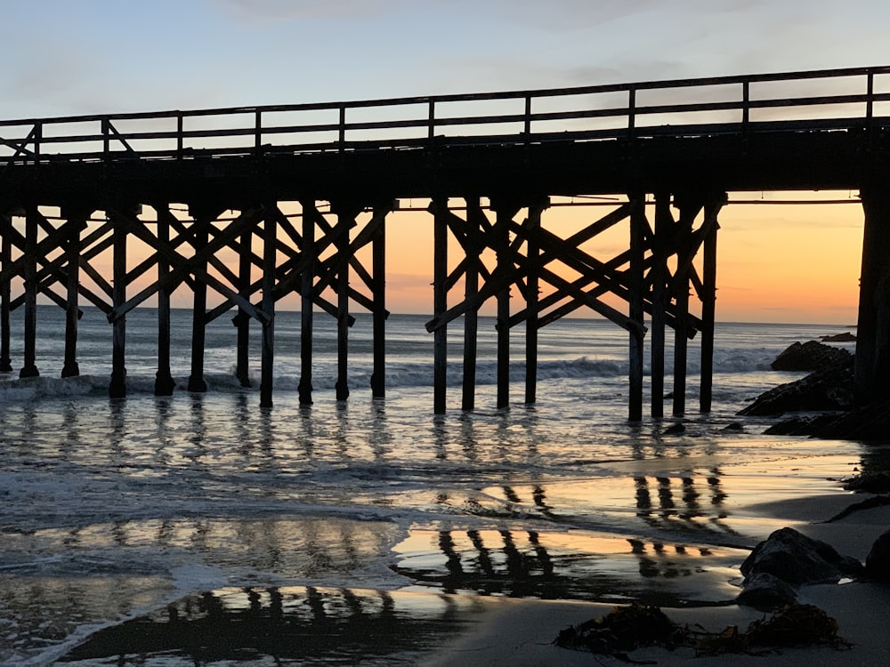 a pier that is next to a body of water