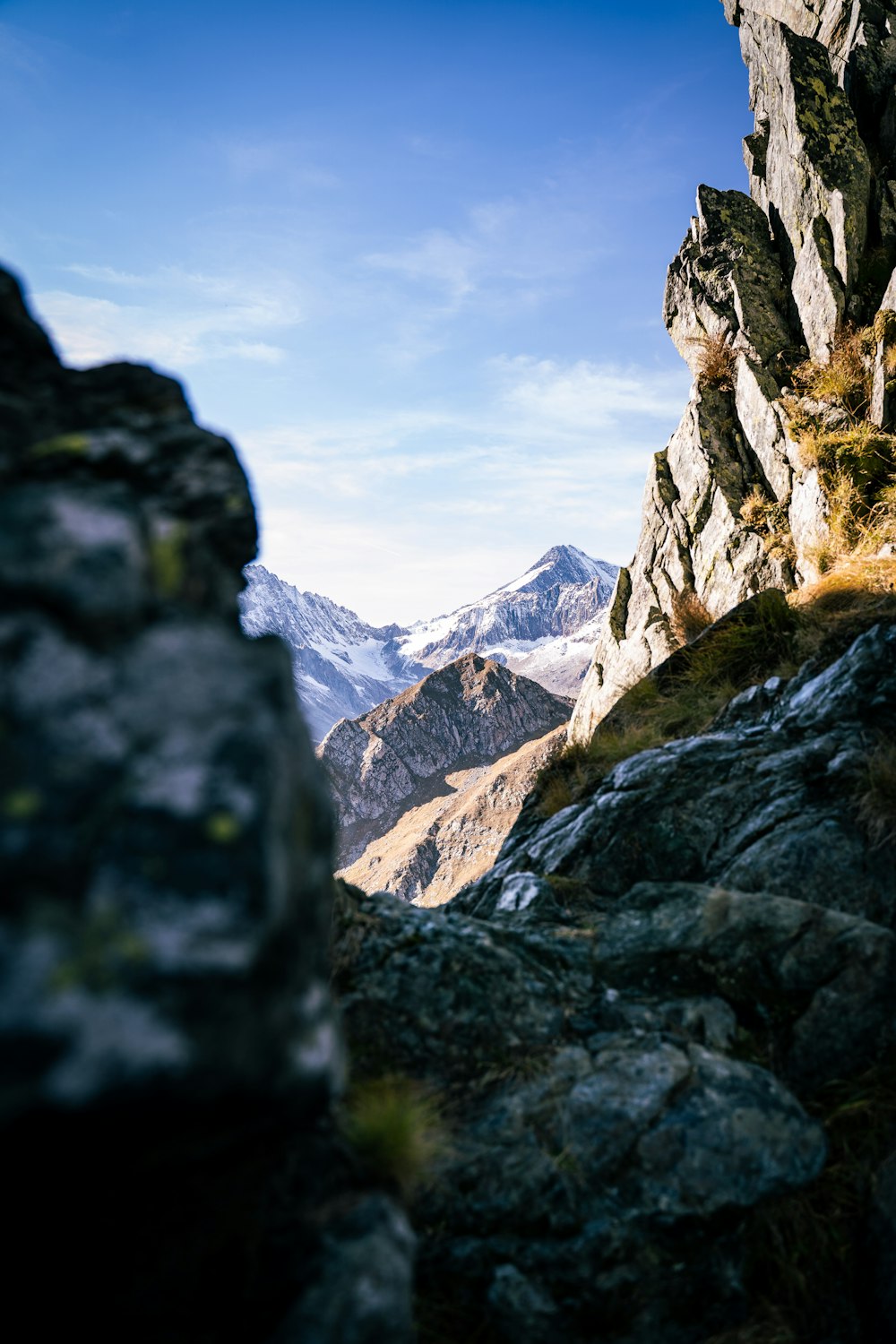 a person standing on top of a rocky mountain