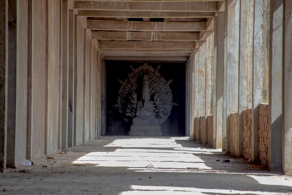 a long hallway with a mural on the wall