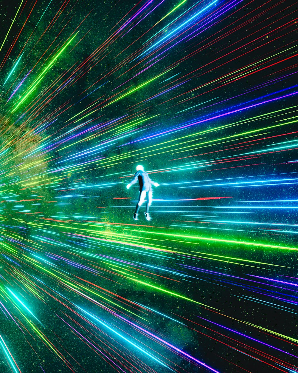 a person is walking through a colorful tunnel of light