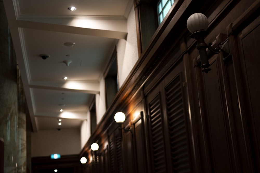 a long hallway with lights on both sides of it