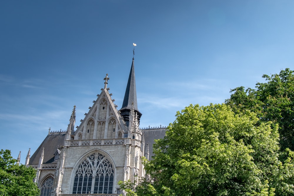 a church with a steeple and a clock tower