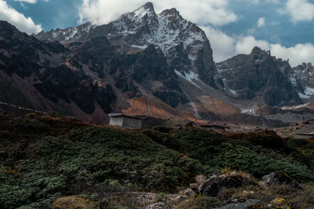 a view of a mountain range with snow on the top