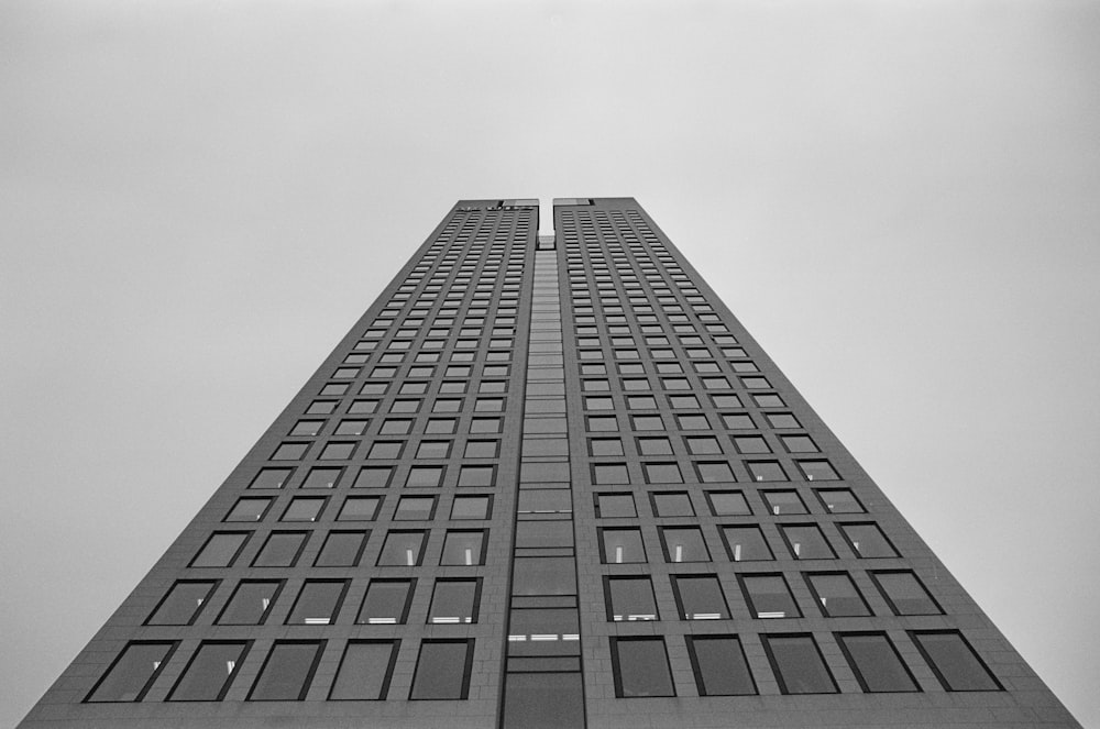 a black and white photo of a tall building