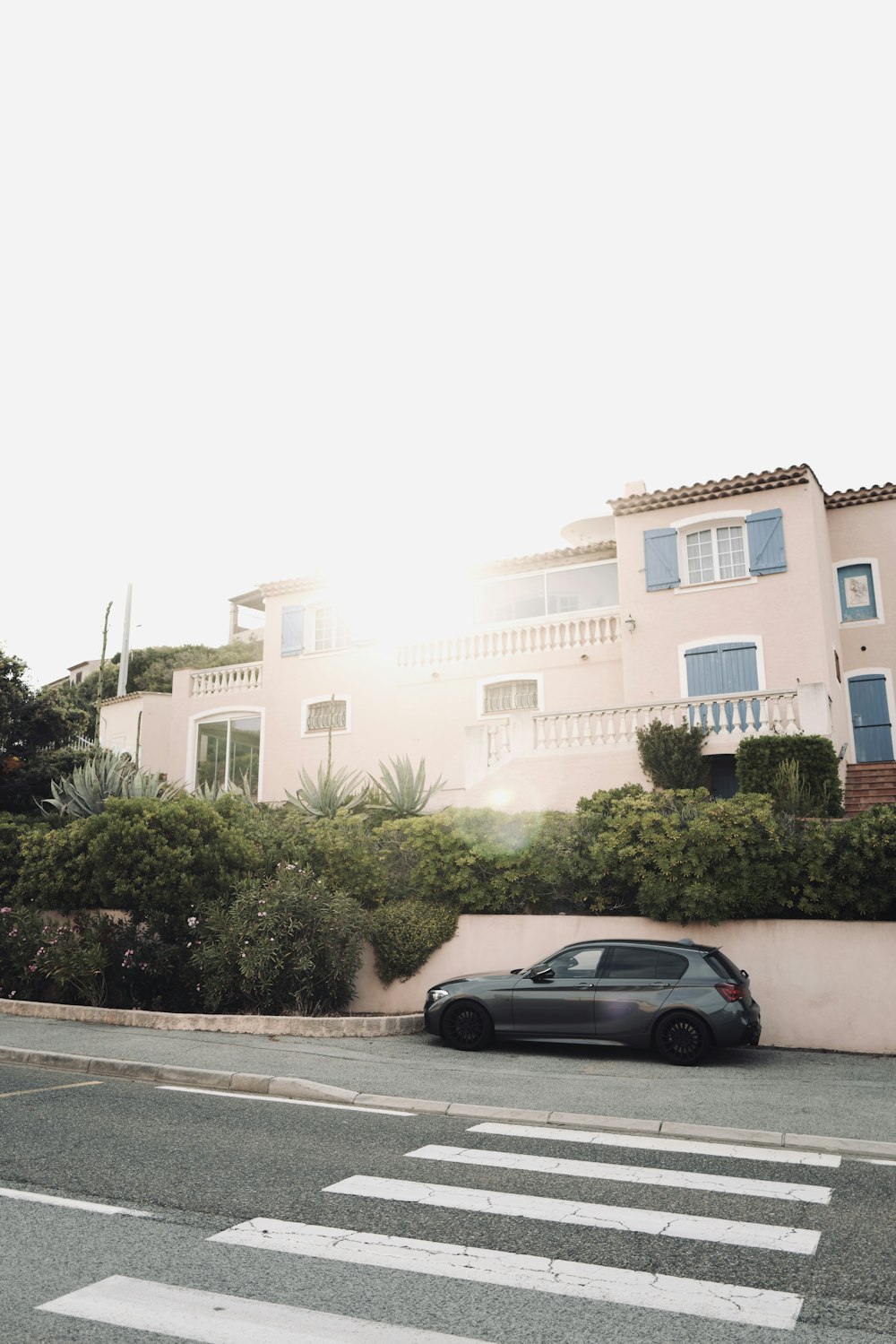 a car is parked on the side of the road