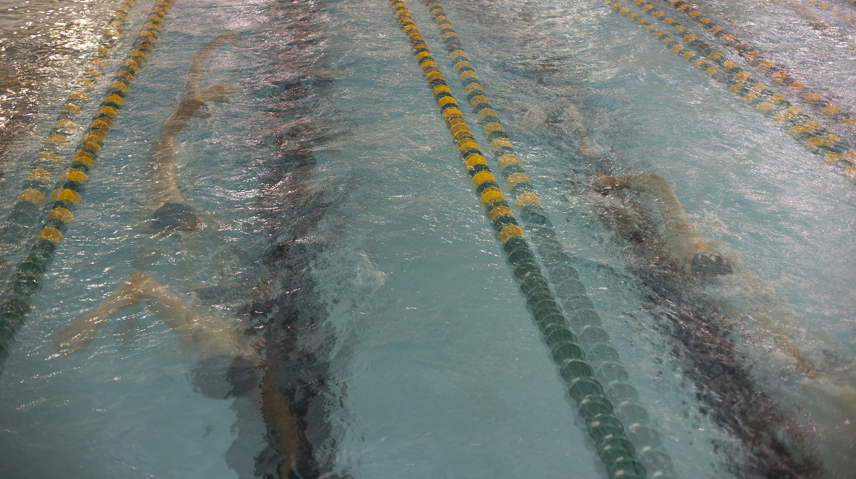 I have been swimming since before I can remember, and it has shaped me to be the person I am today. In these photos, I explore swimming and my shifting passion for the sport. What emotions do I feel? Do I have the same drive as when I first started? Were the many sacrifices worth it? I use these questions to examine the unseen side of swimming and to display my authentic and genuine feelings. It has been important to capture moments of myself and my teammates - people who have had a similar journey to me -  who know the happiness and hardships of the sport. Visit https://jakealy.com for more.