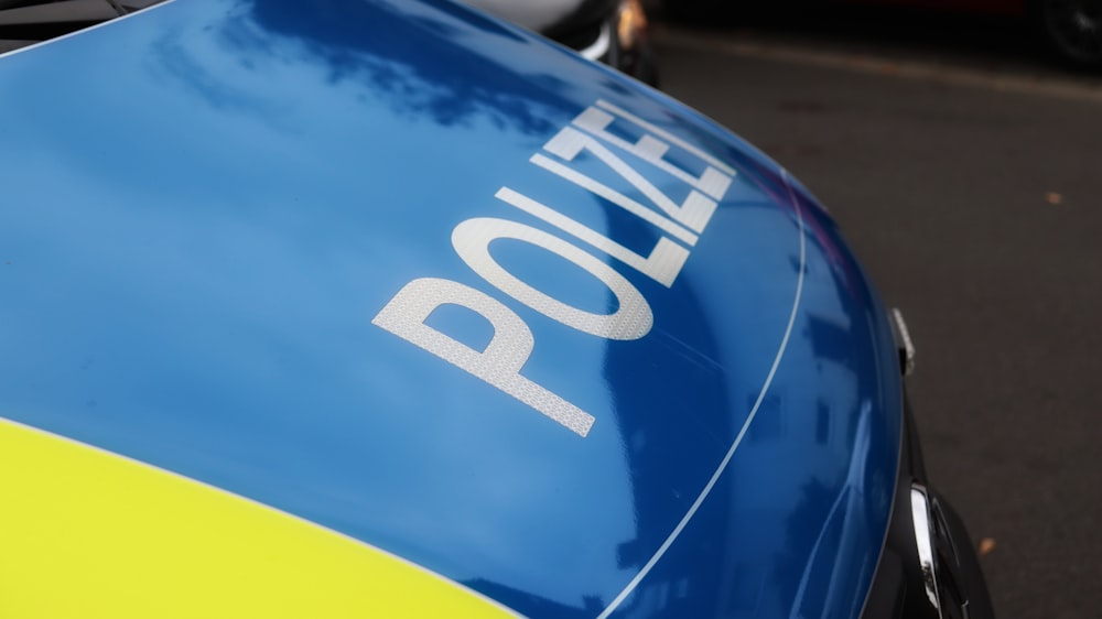 a police car parked on the side of the road