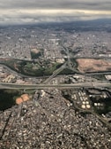 An aerial view of a smart city with surveillance cameras.