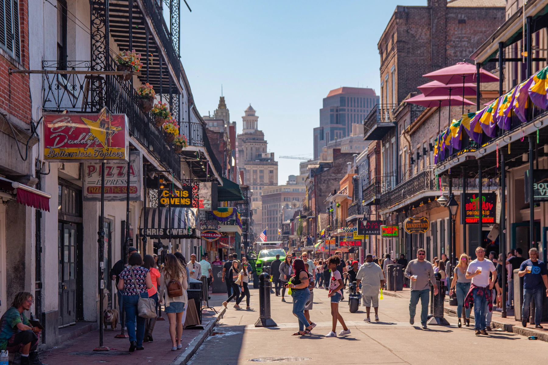 An atmospheric street of colourful historic buildings in the French Quarter, New Orleans