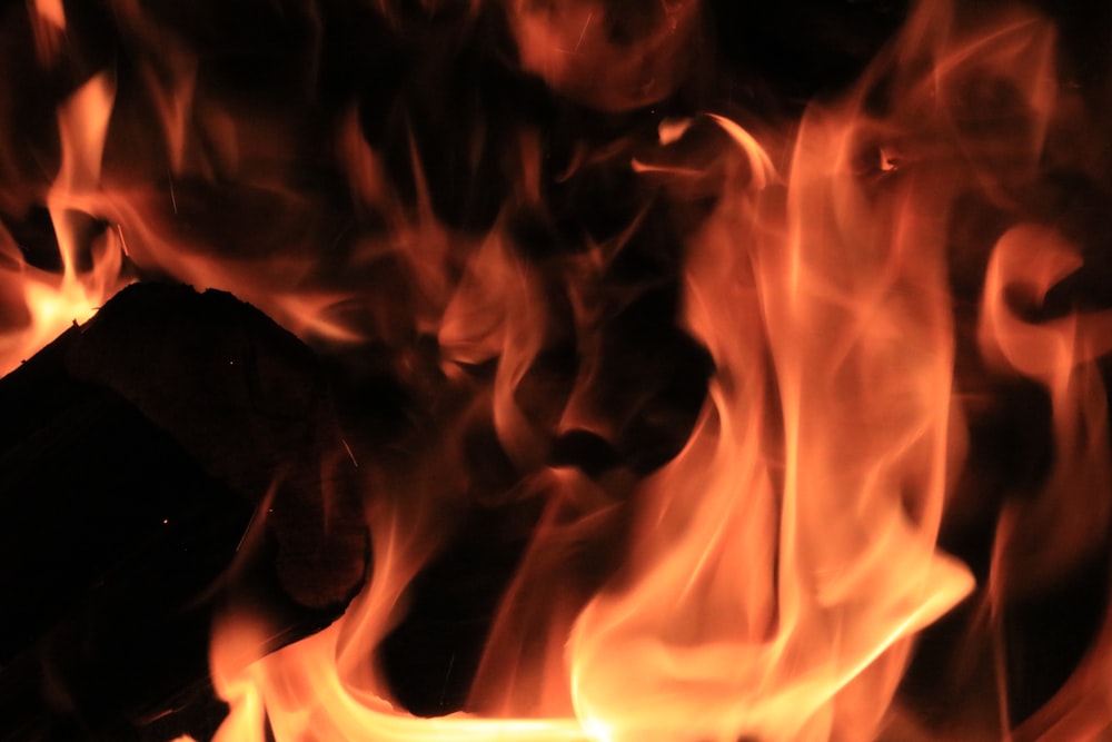 a close up of a fire burning in a fireplace