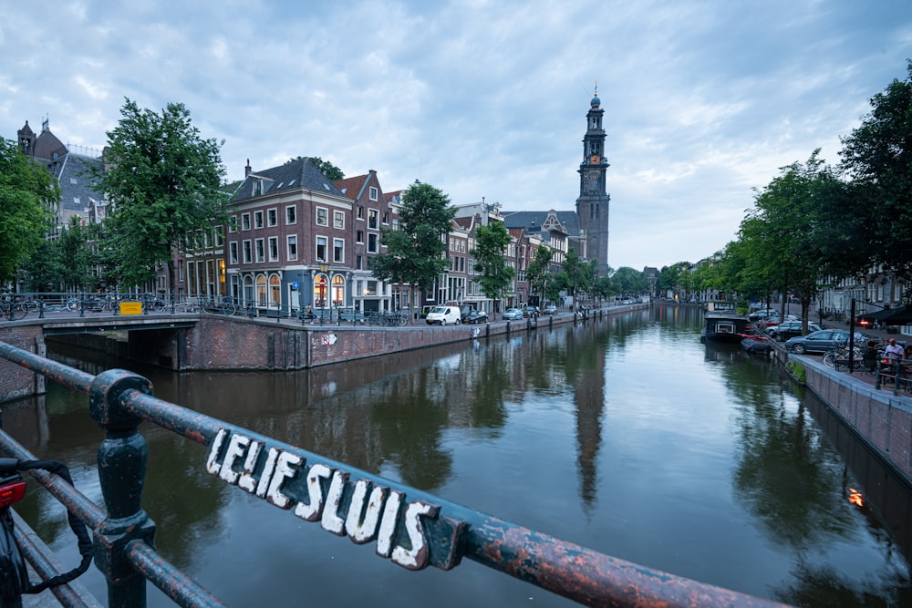 a view of a canal with a sign on it