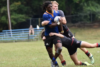 a group of young men playing a game of soccer