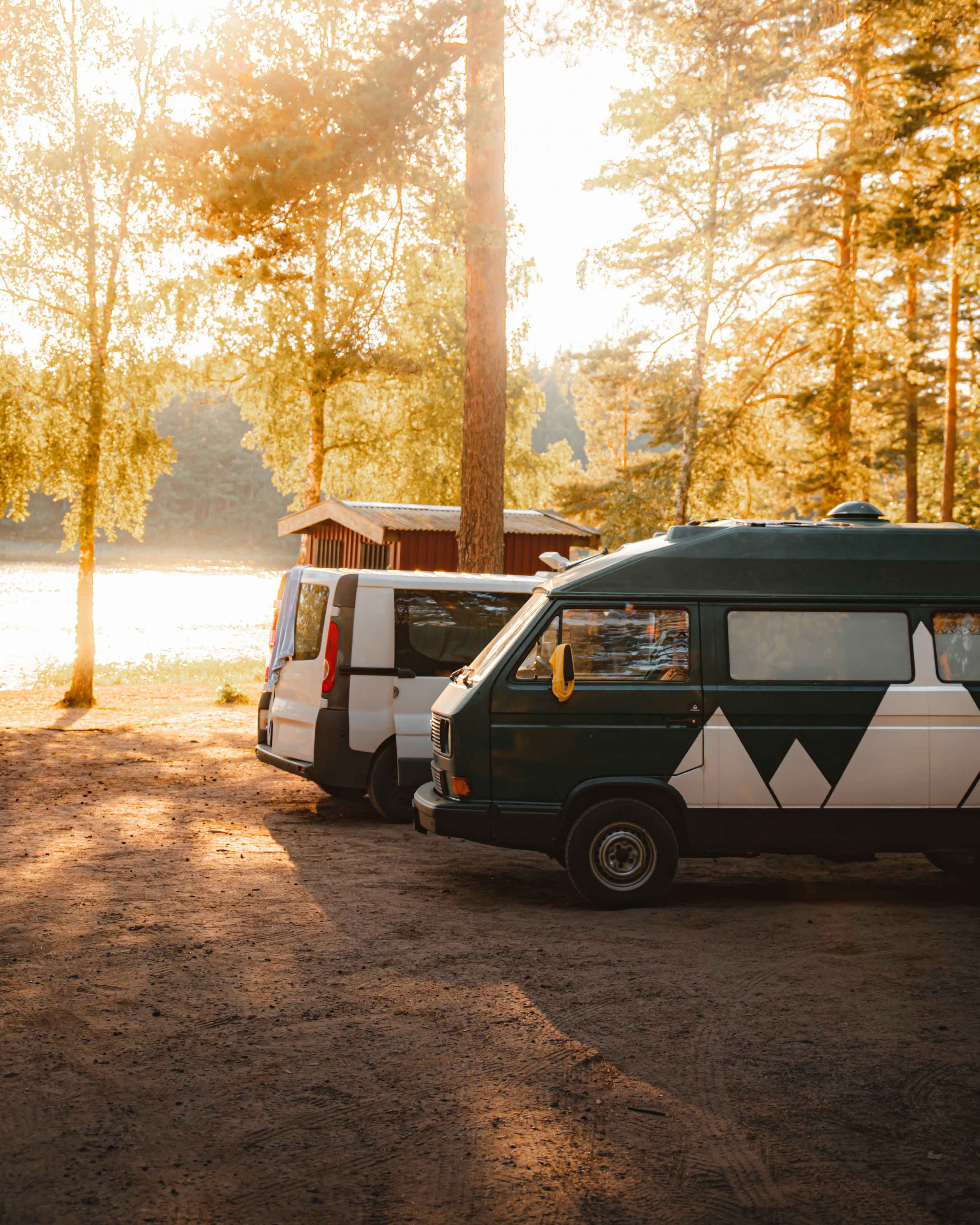 a couple of vans parked next to each other