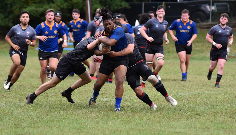 a group of young men playing a game of rugby