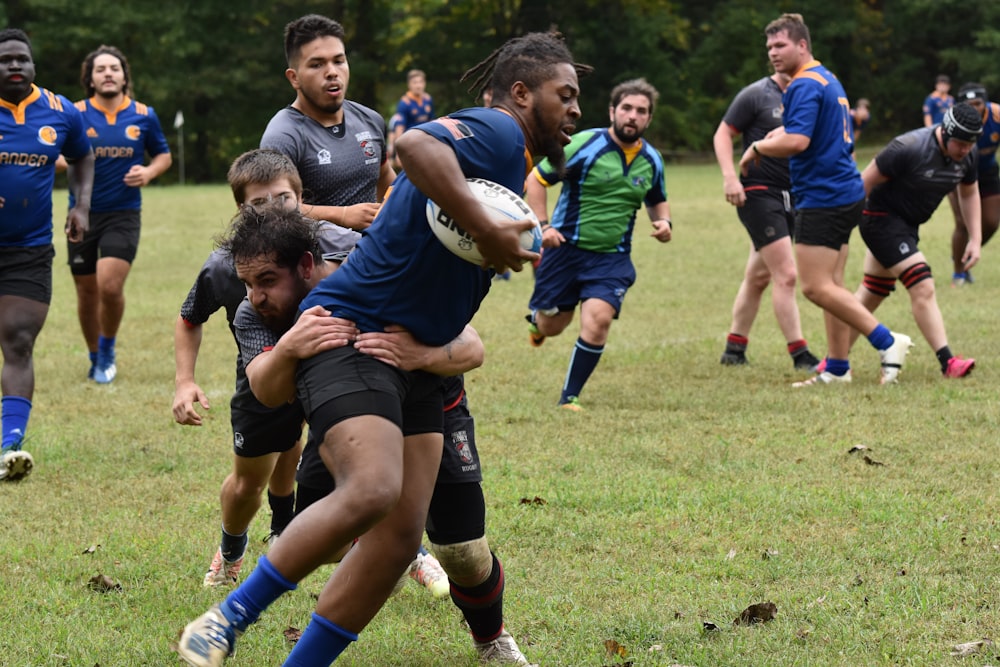 a group of men playing a game of rugby