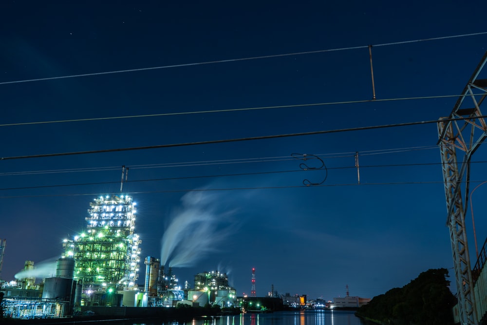 a view of a city at night from across the river