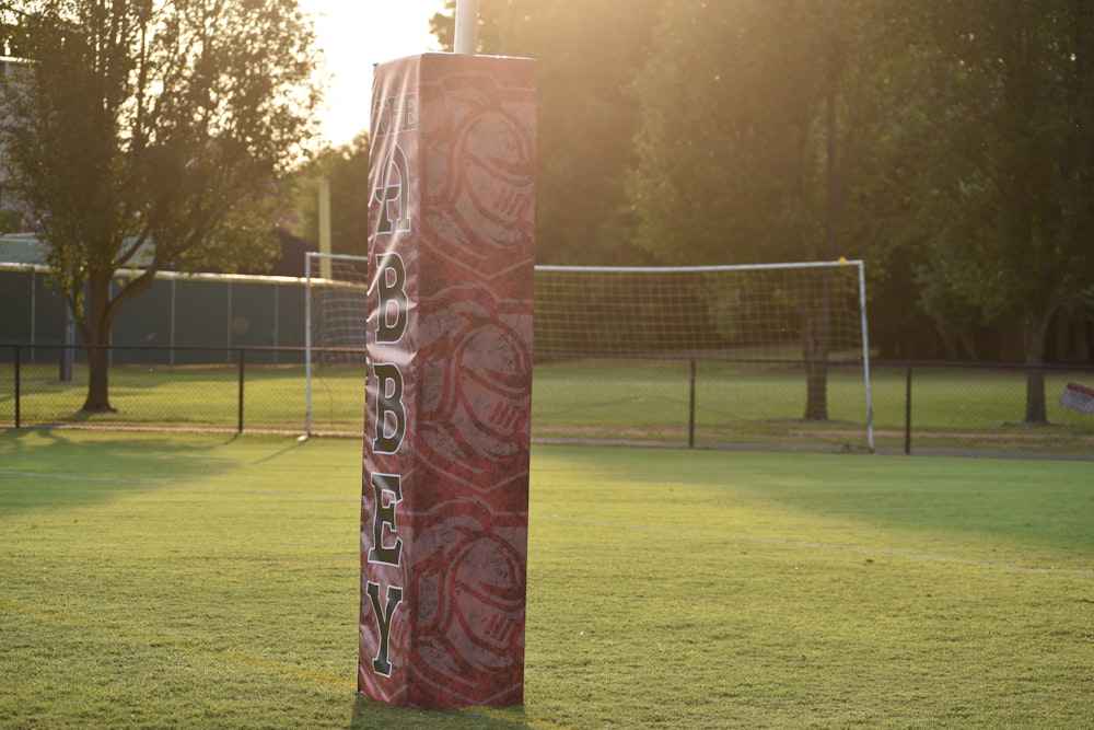 a soccer goal post in the middle of a soccer field