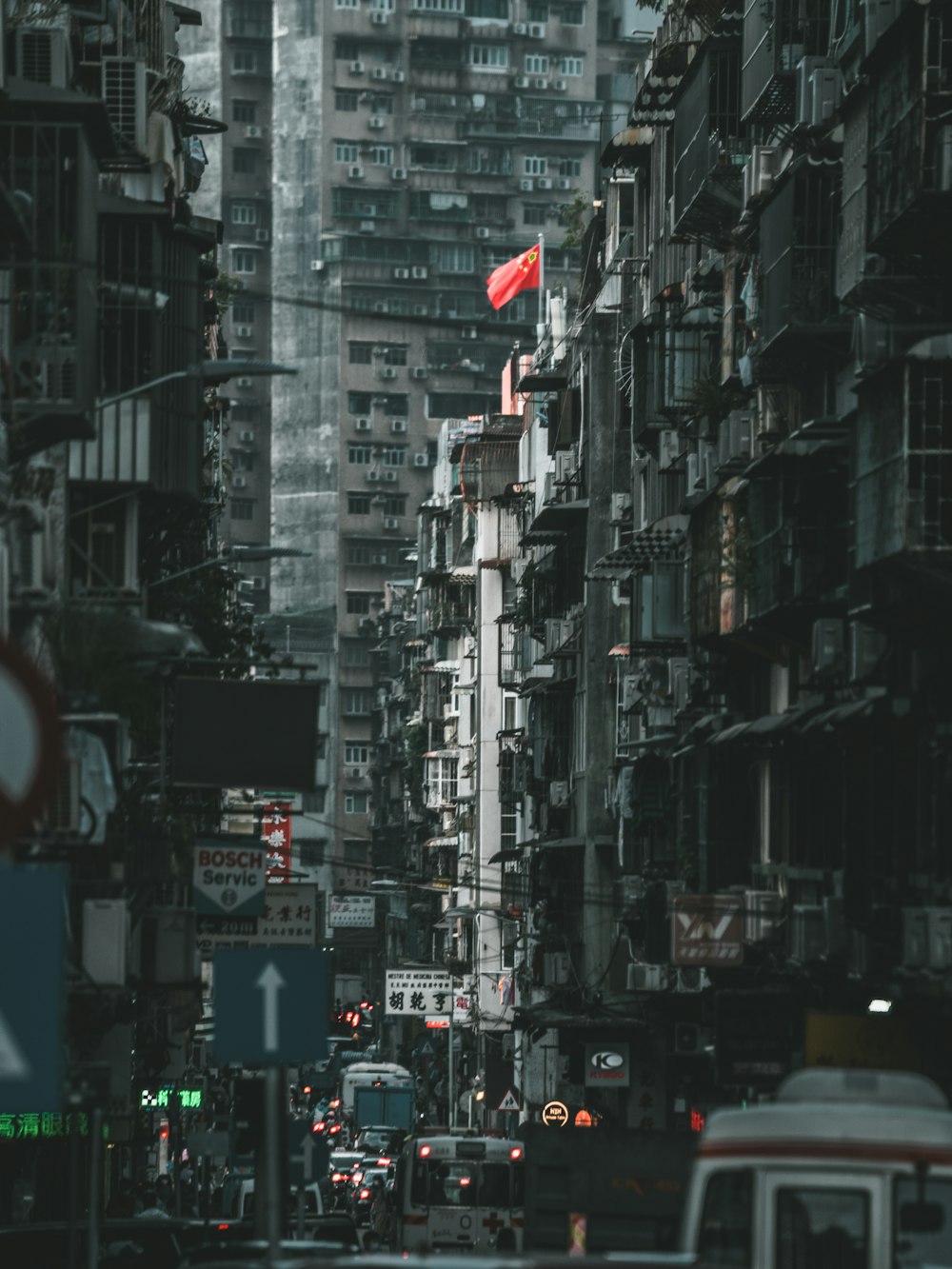 a city street filled with lots of tall buildings