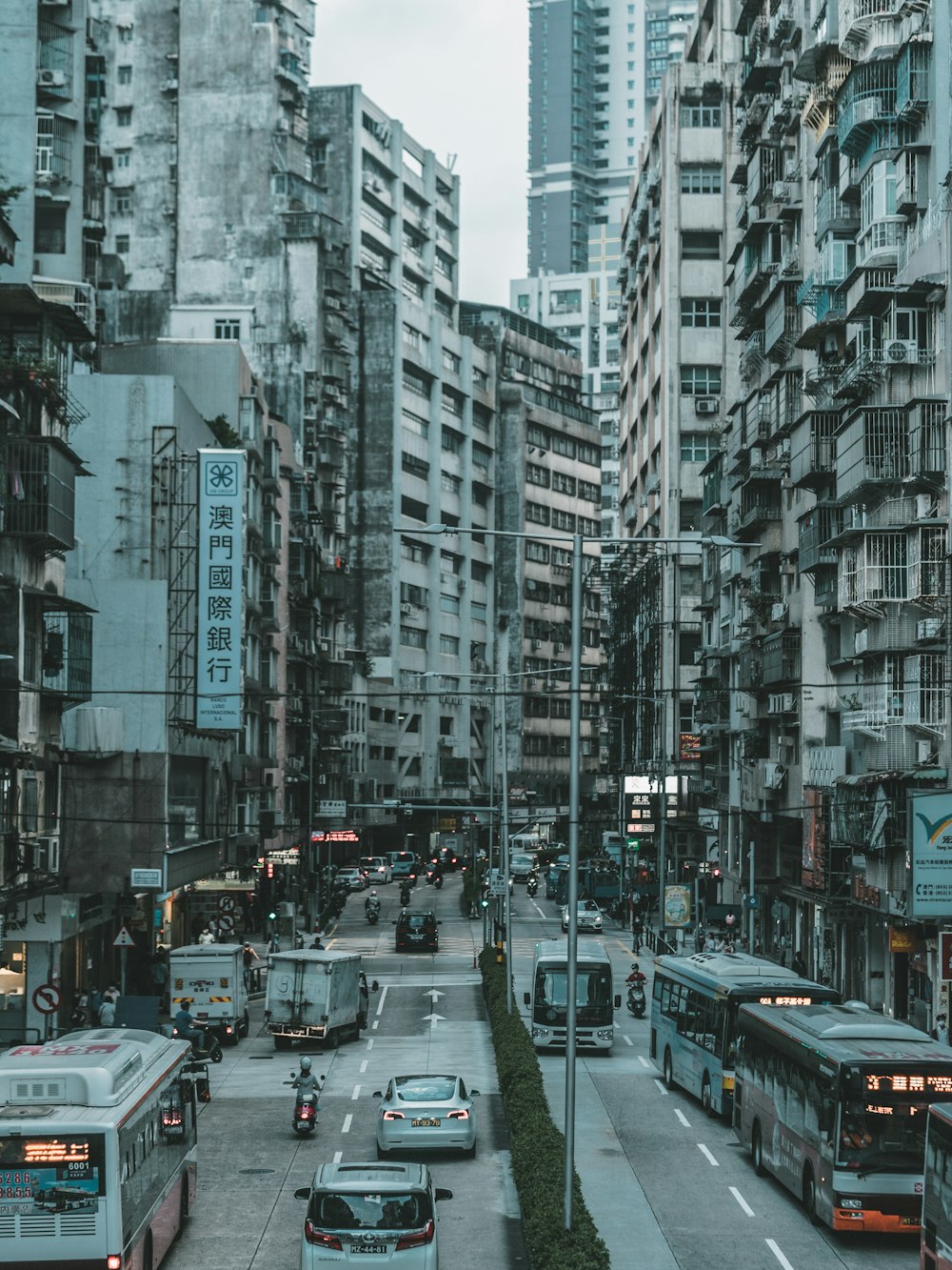 a city street filled with lots of tall buildings