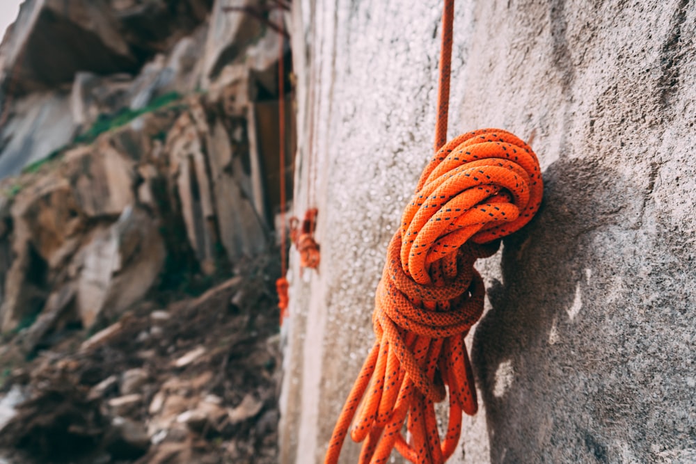 a rope hanging on the side of a building