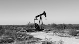 a black and white photo of an oil pump