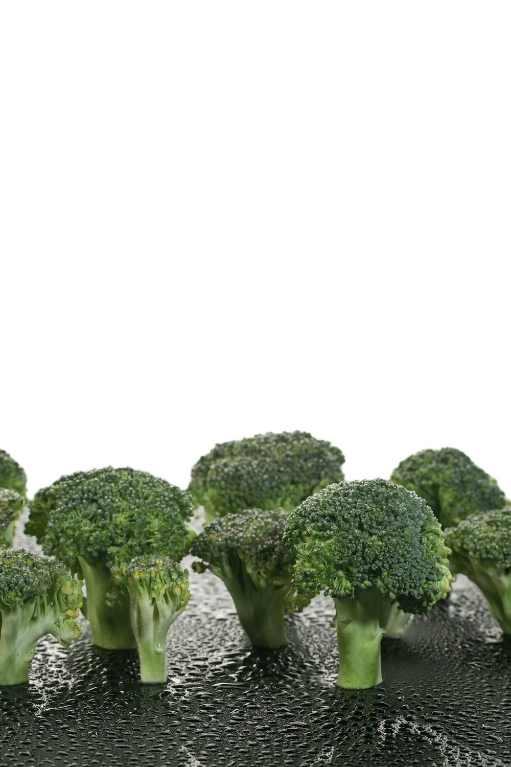 a group of broccoli heads sitting on top of each other