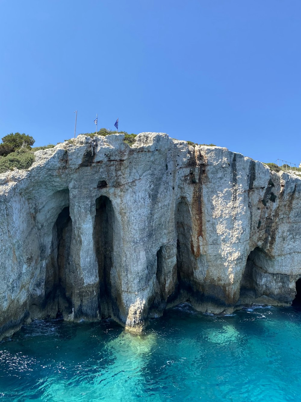 a large rock formation with a cave in the middle of it