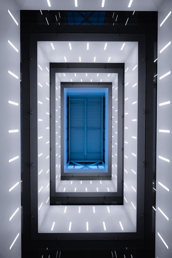 a room with a blue window in the middle of it