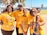 A smiling group of community members participating in a teeme initiative.