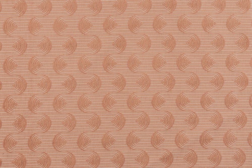 a close up of a wall with a pattern on it