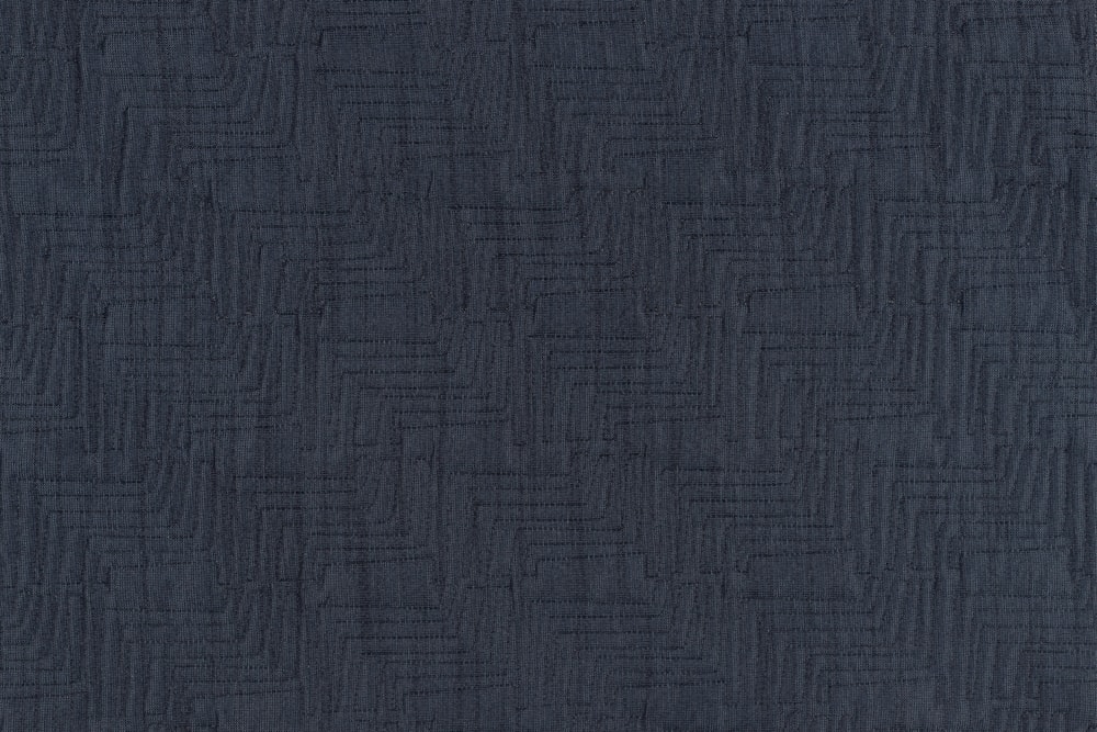 a dark blue background with a pattern on it