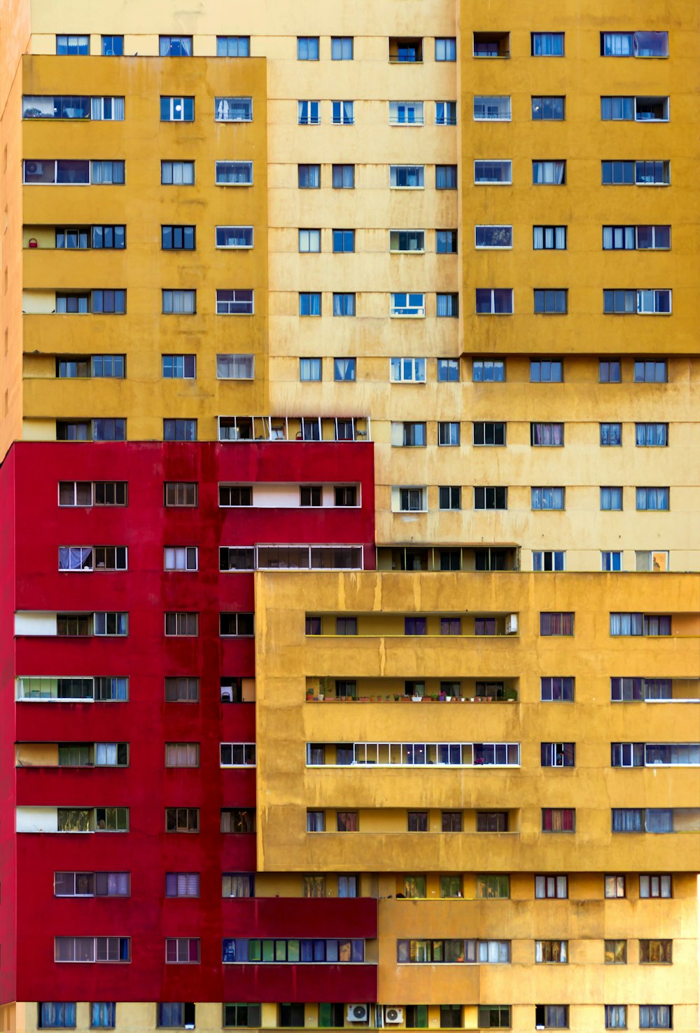 a group of multicolored buildings in a city