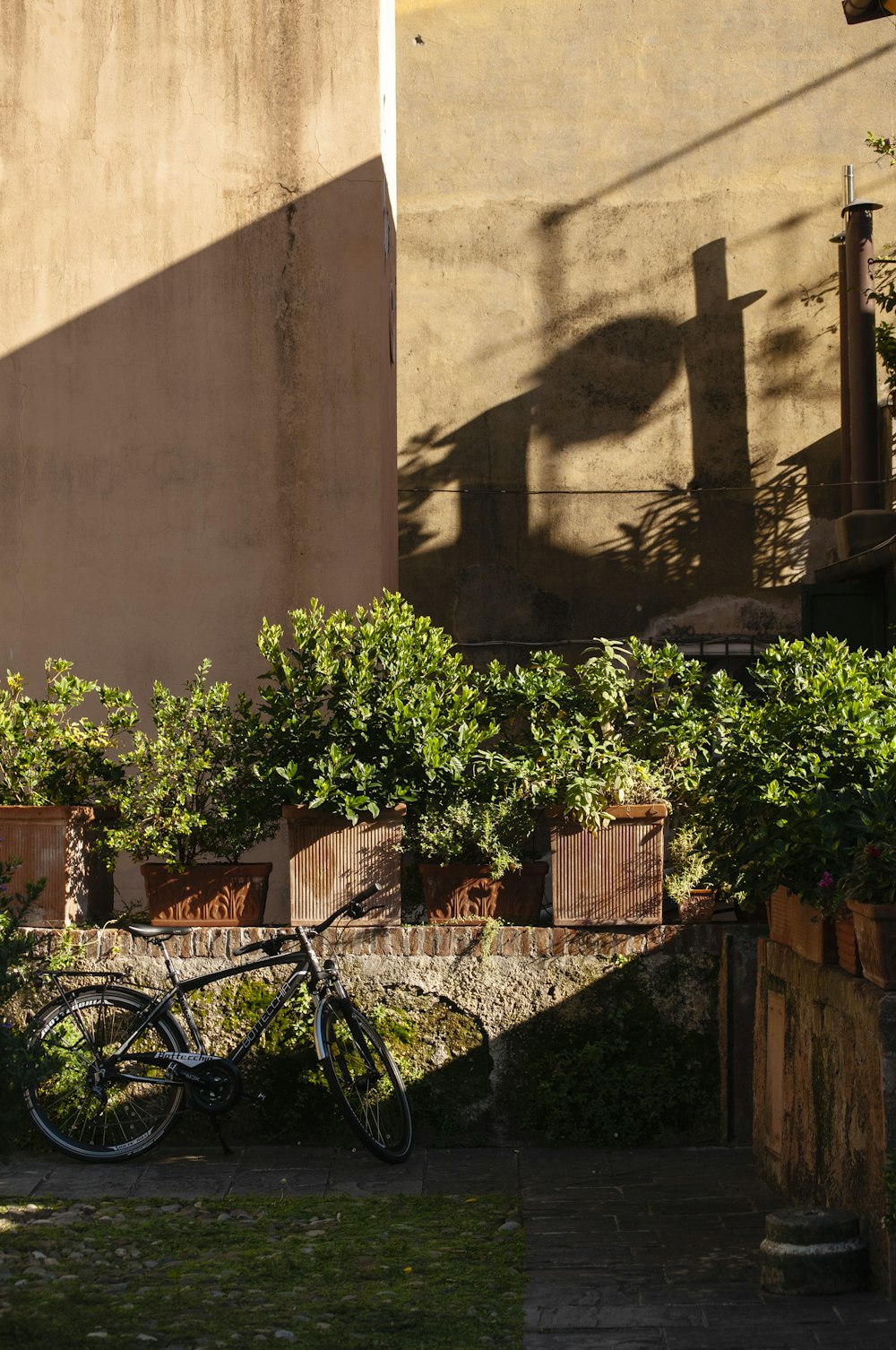 a bike is parked in front of a building