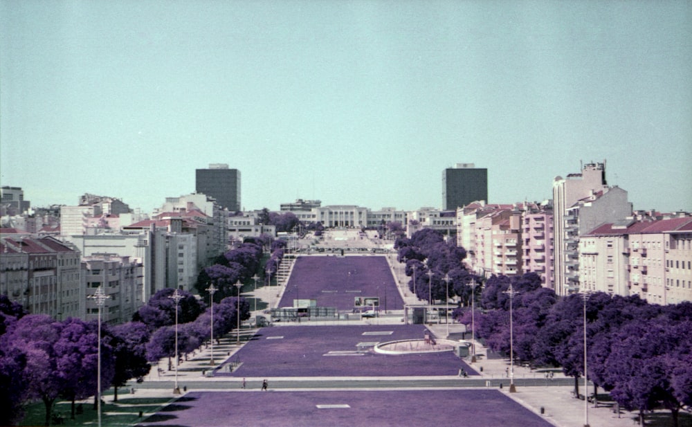 a view of a city from the top of a hill