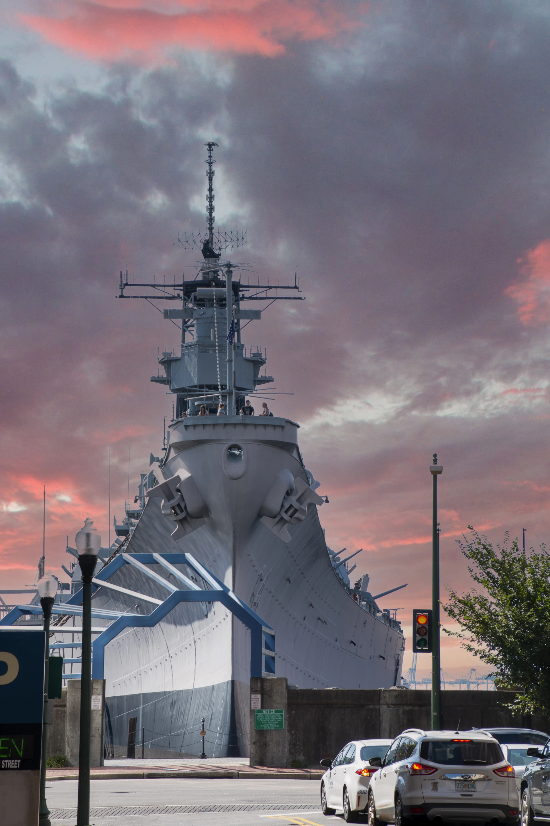 a large ship sitting in the middle of a parking lot