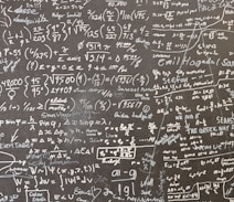 a blackboard with a lot of writing on it