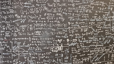 a blackboard with a lot of writing on it